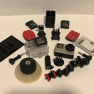 GoPro HERO4 Silver Bundle - Dual Charger, 3 Batteries, Housing & Mounts (read)